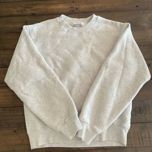 Heather Grey TNA cozy fleece sweater.